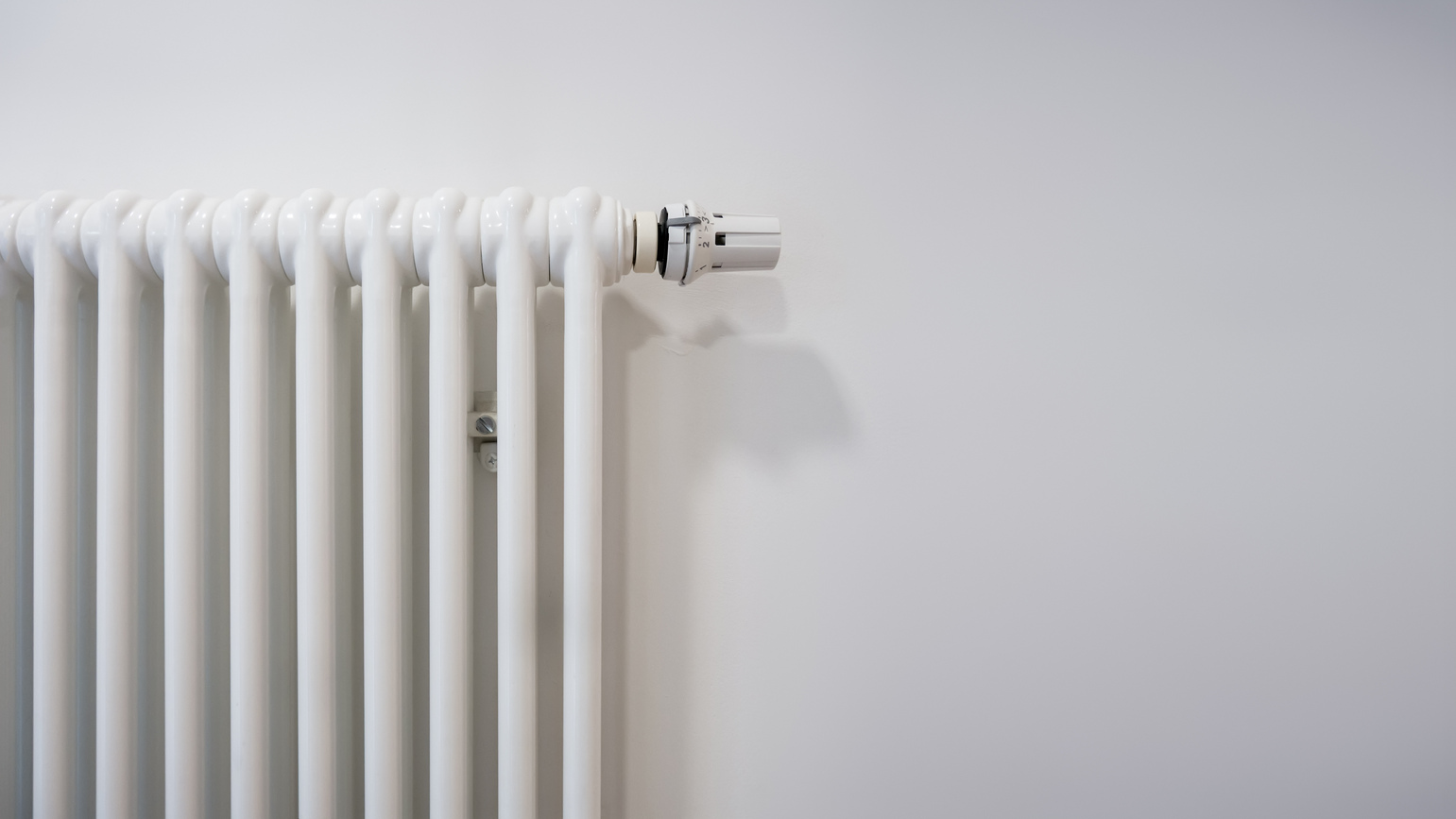 typical radiator on a white wall with space for your content
